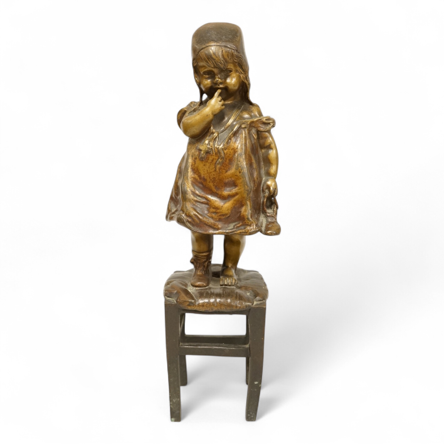 Juan Clara, a figure of a girl on a stool, 21.5cm high
